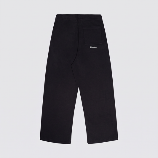 Pantalón oversize de felpa con bordado