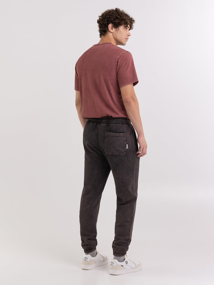 Marble wash jogger trousers with arch letter embroidery
