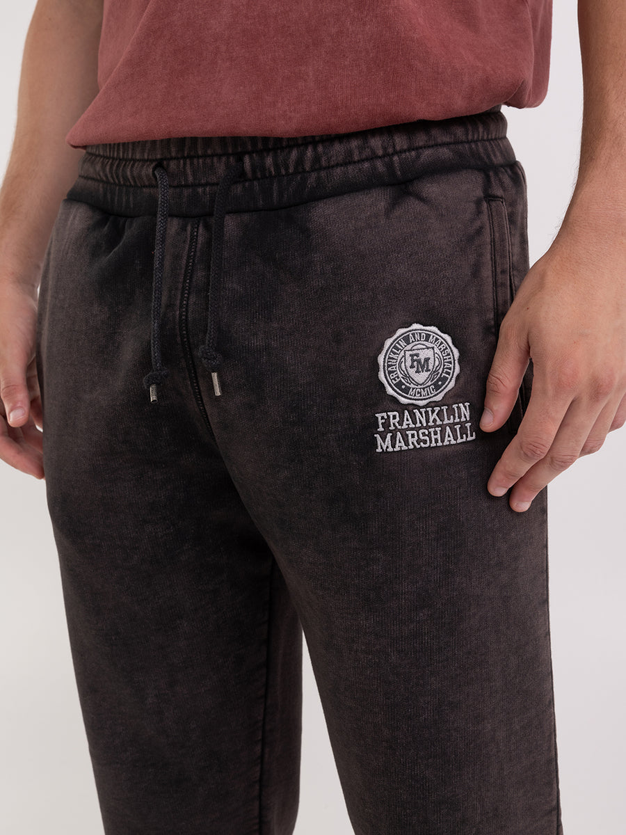 Pantaloni jogger marble wash con ricamo arch letter