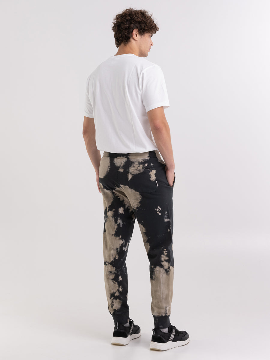 Tie-dye jogger trousers with varsity embroidery