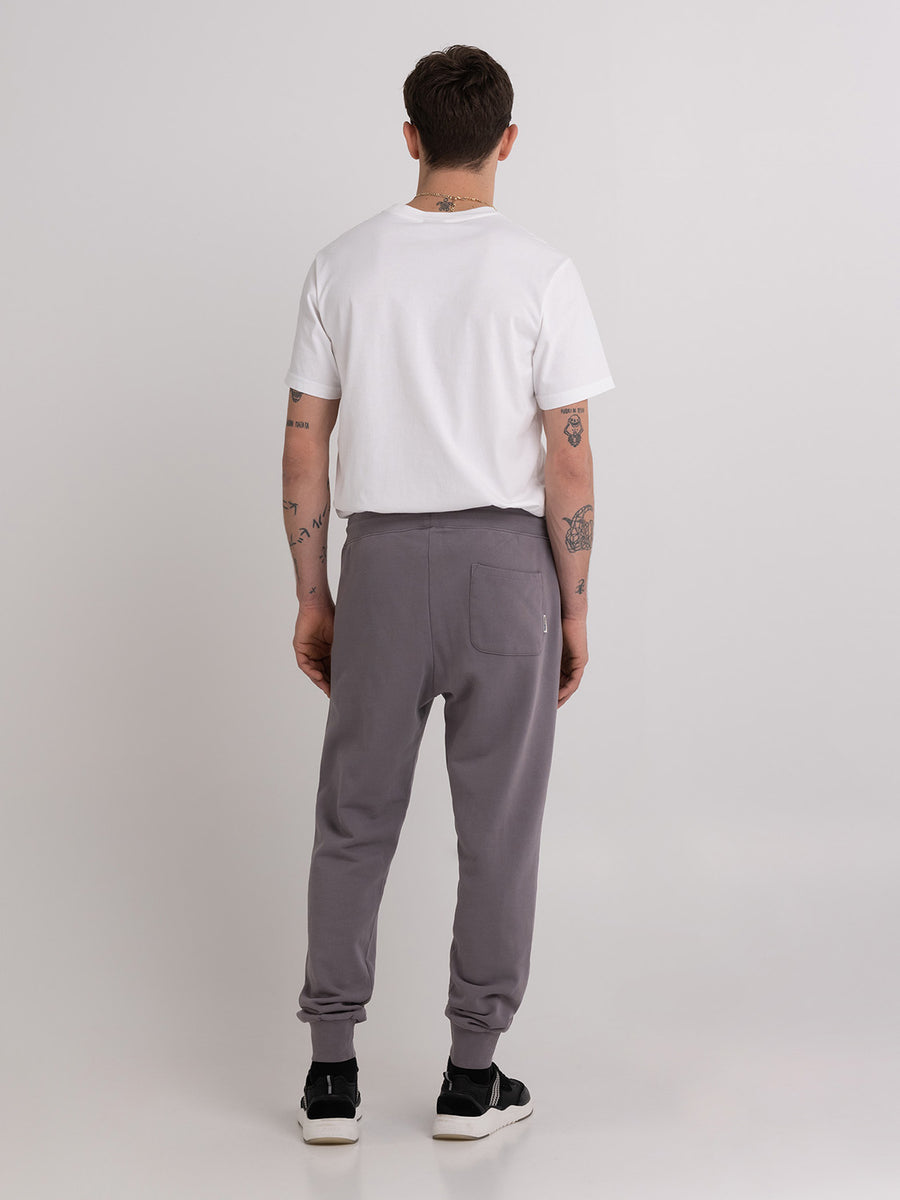 Agender jogger trousers with Arch letter embroidery