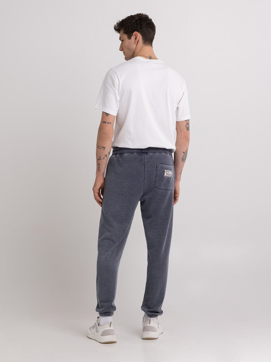 Burn out jogger trousers with arch letter embroidery