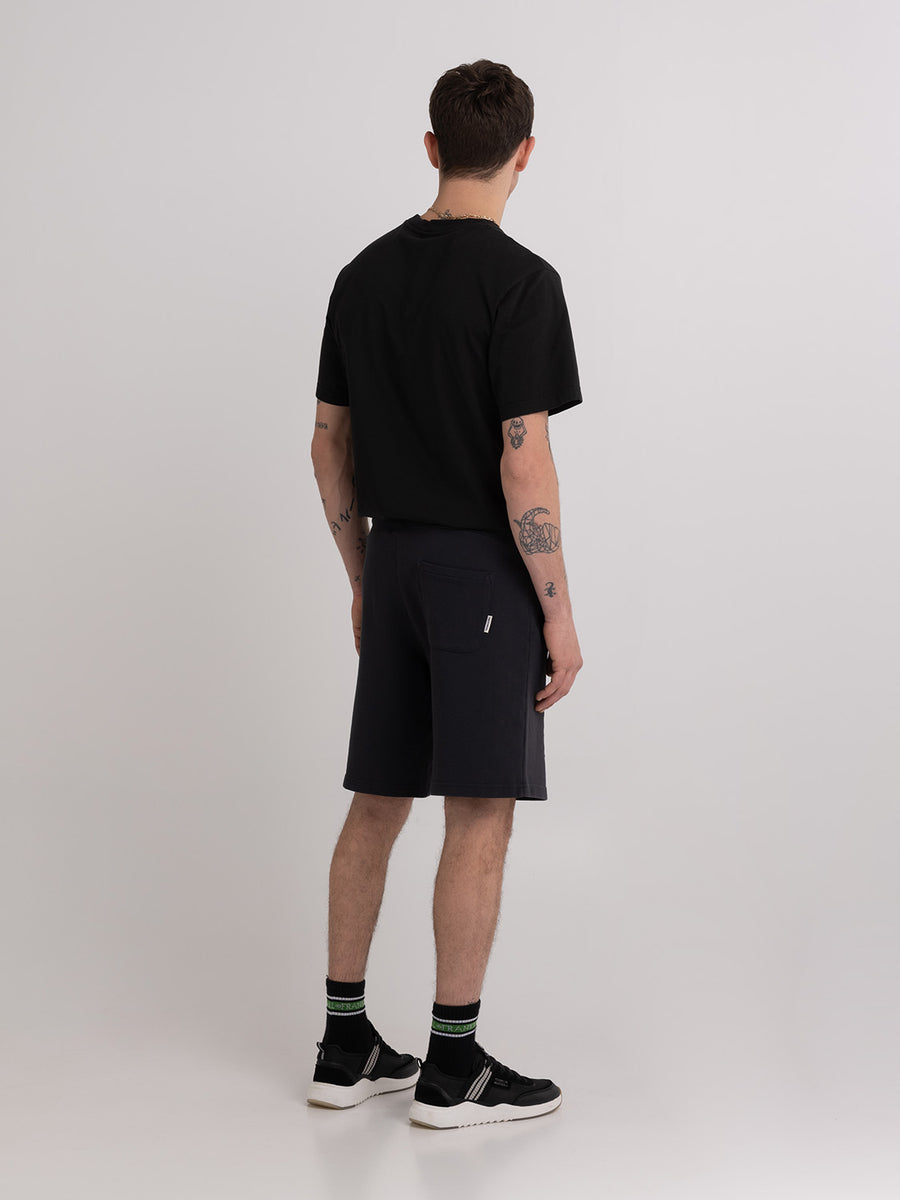 Agender fleece shorts with Pennant patch