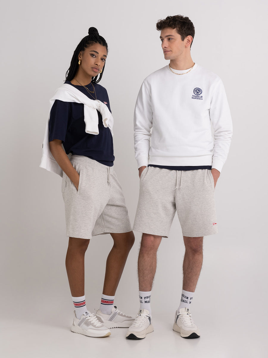 Agender fleece shorts with Pennant patch