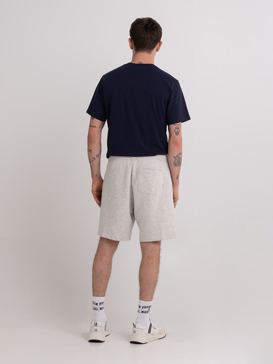 Agender fleece shorts with Pennant patch