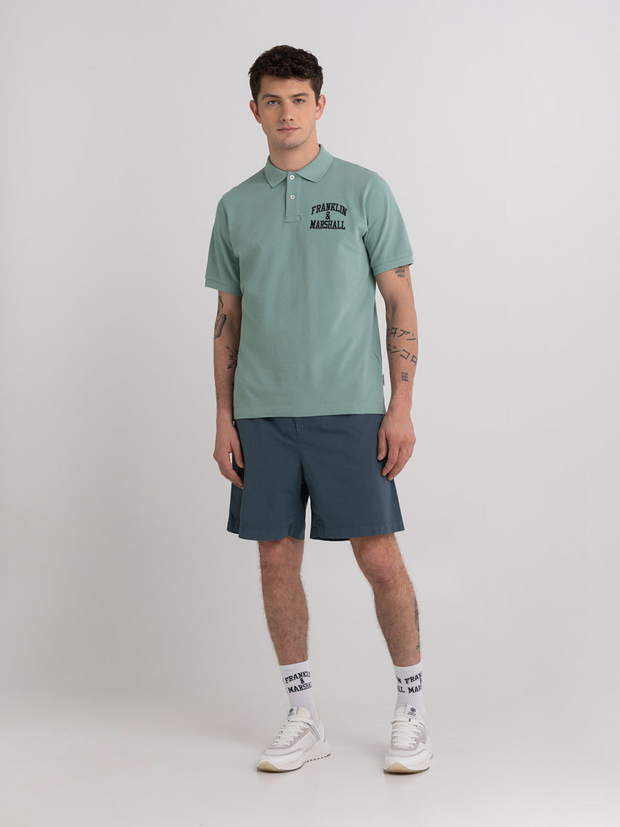 Polo shirt in piqué cotton with arch letter logo embroidery