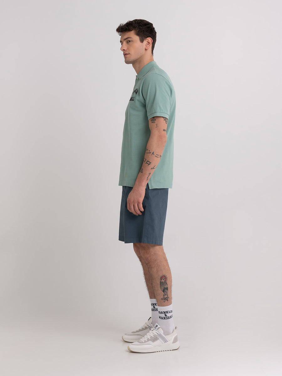 Polo shirt in piqué cotton with arch letter logo embroidery