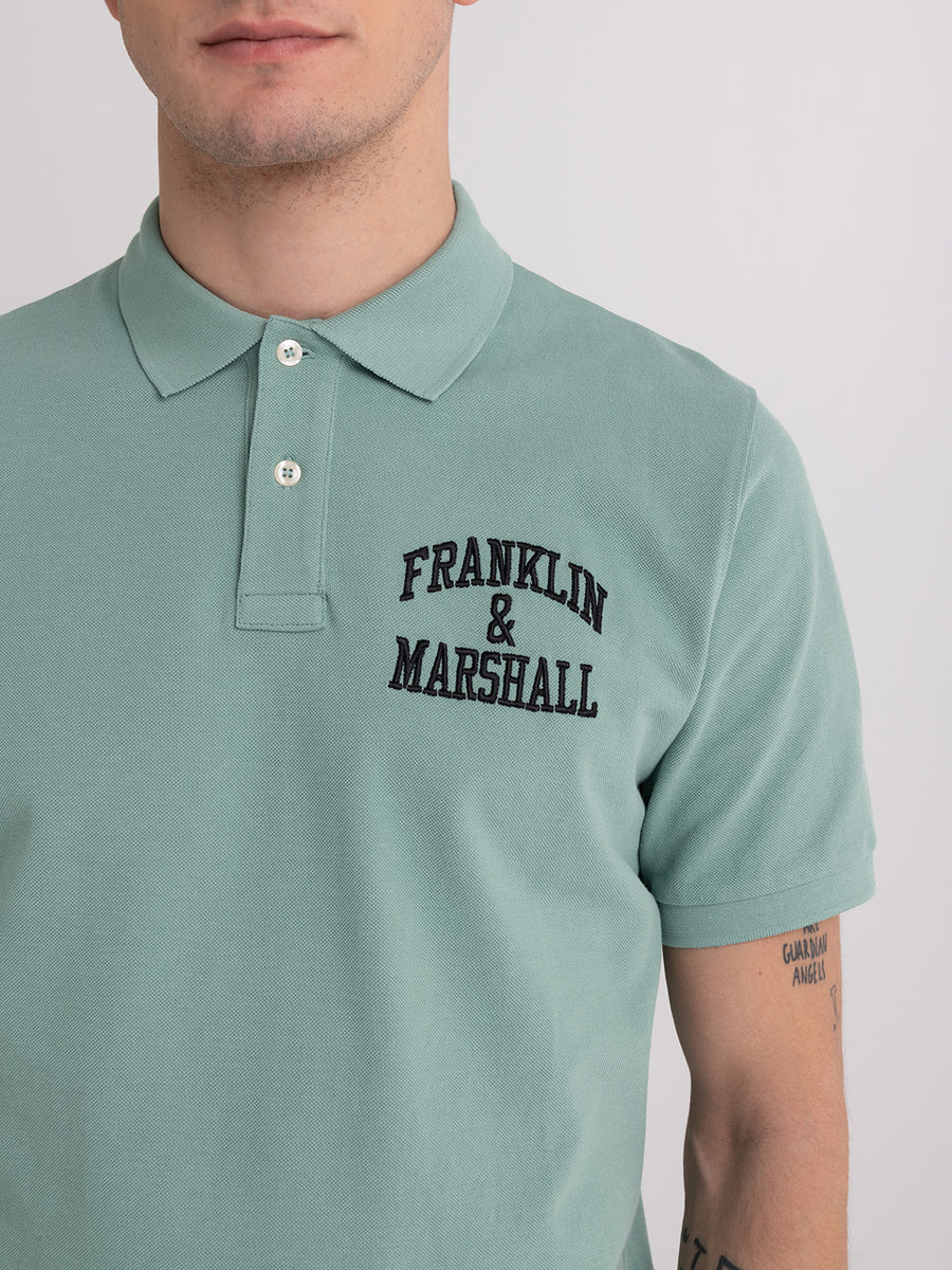 Polo shirt in piqué cotton with arch letter logo embroidery