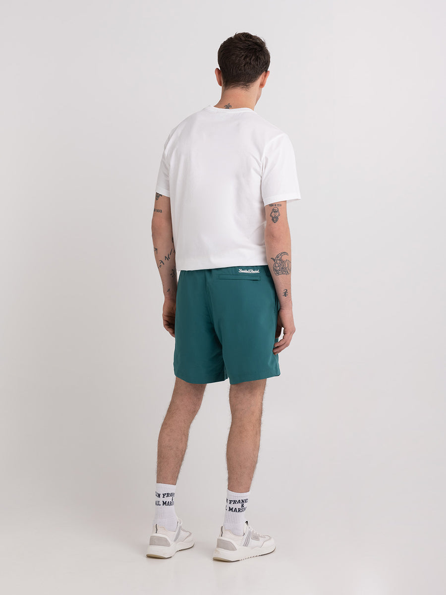 Shaded-off recycled nylon swimming trunks with Crest logo print