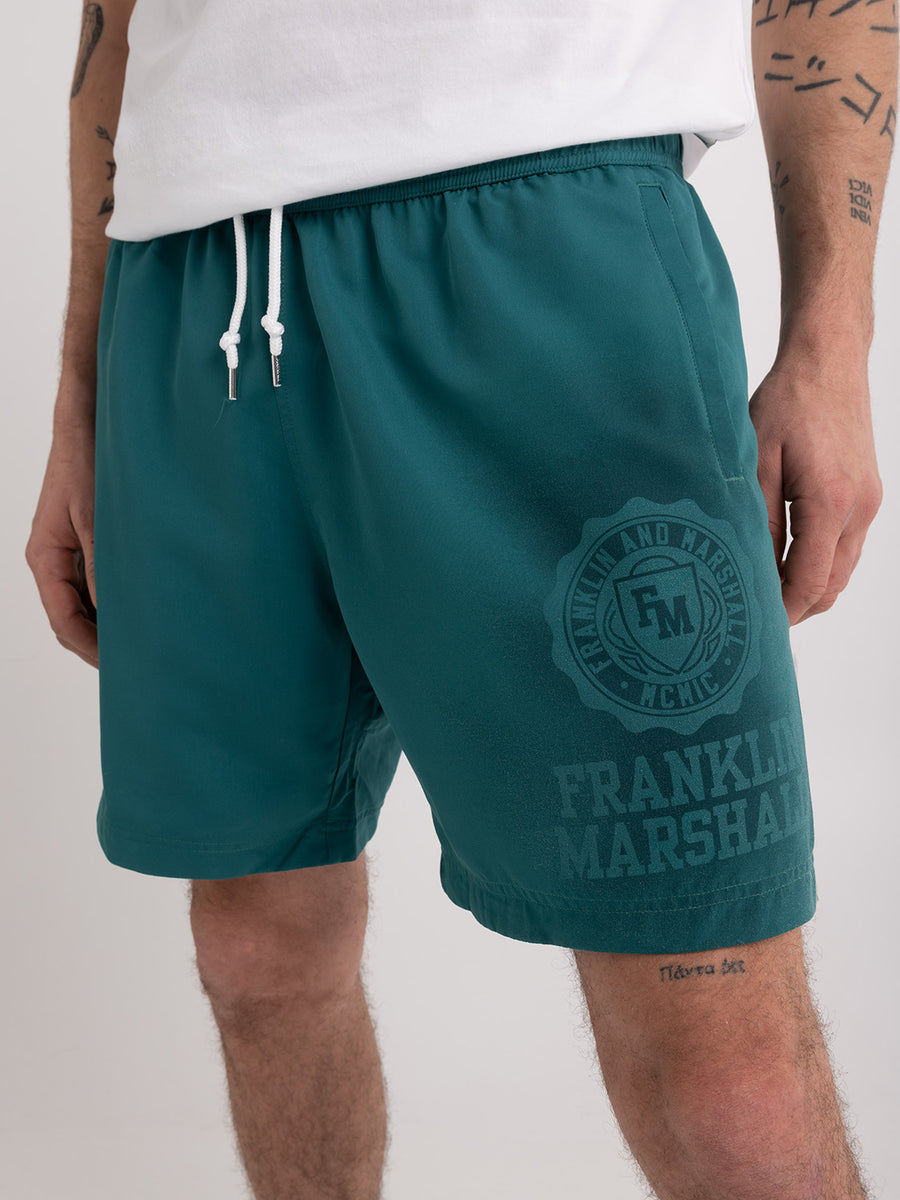 Shaded-off recycled nylon swimming trunks with Crest logo print
