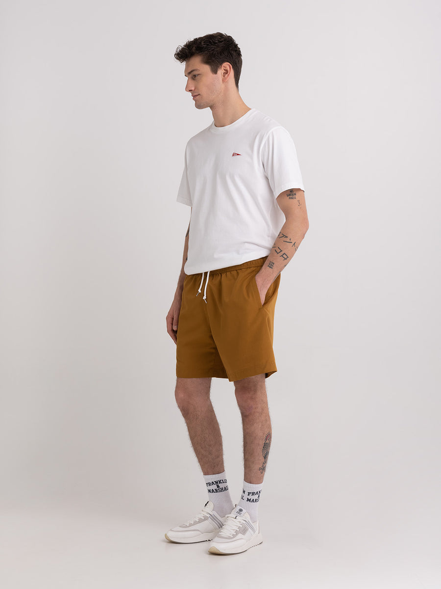 Shaded-off recycled nylon swimming trunks with Crest logo print