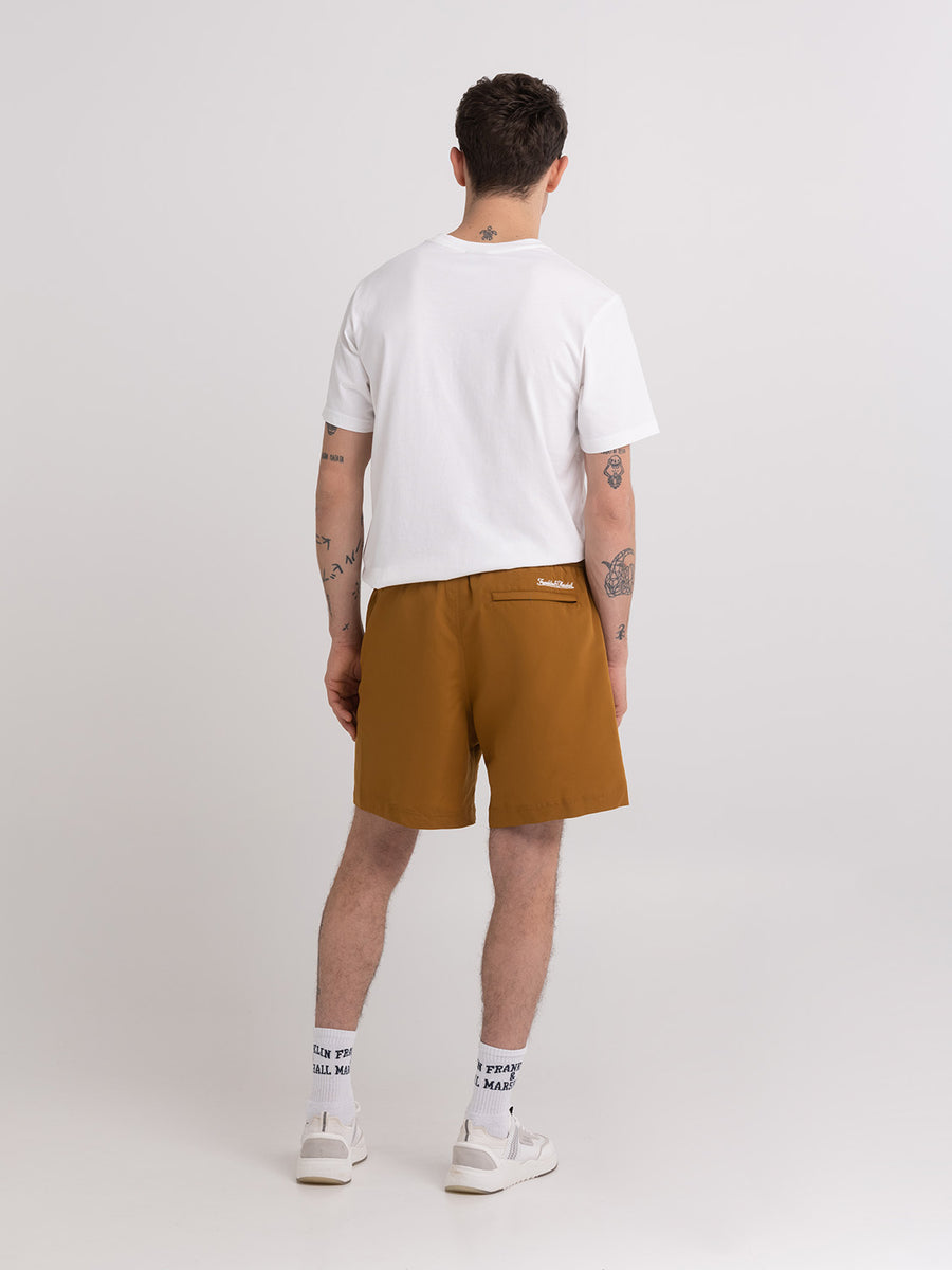 Shaded-off recycled nylon swimming trunks with Crest logo print