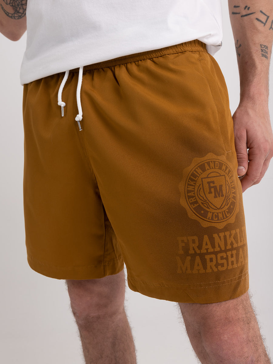 Shaded-off recycled nylon swimming trunks with Crest logo print
