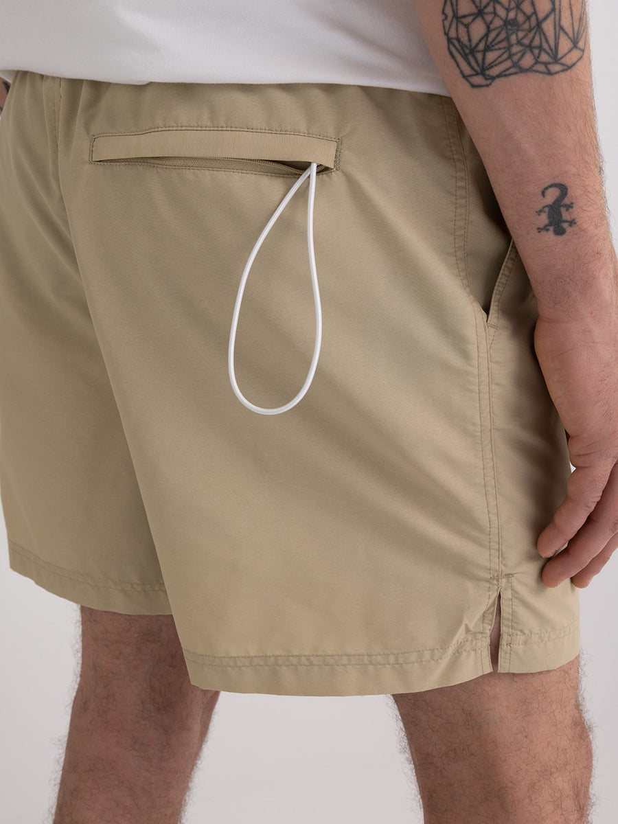 Recycled nylon swimming trunks with arch letter logo print