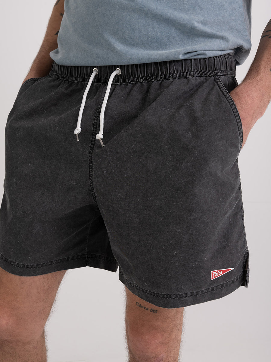 Shaded-off recycled nylon swimming trunks with Pennant patch