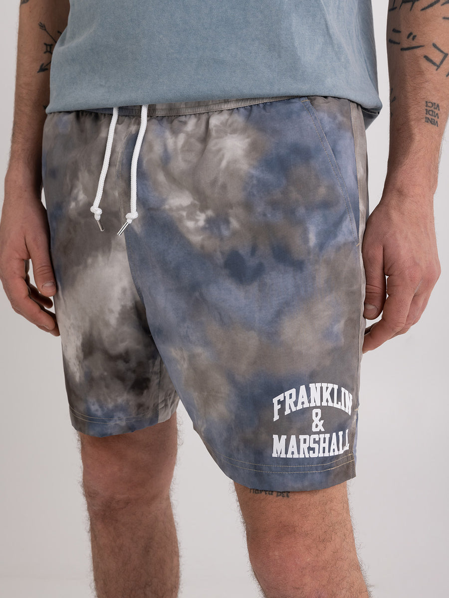 Recycled poly ice dye swimming trunks with arch letter logo print