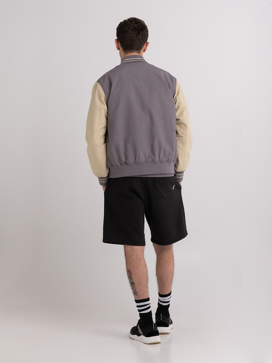 Varsity jacket with arch letter logo embroidery