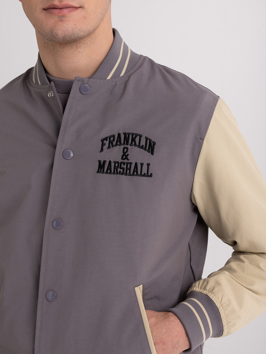 Varsity jacket with arch letter logo embroidery