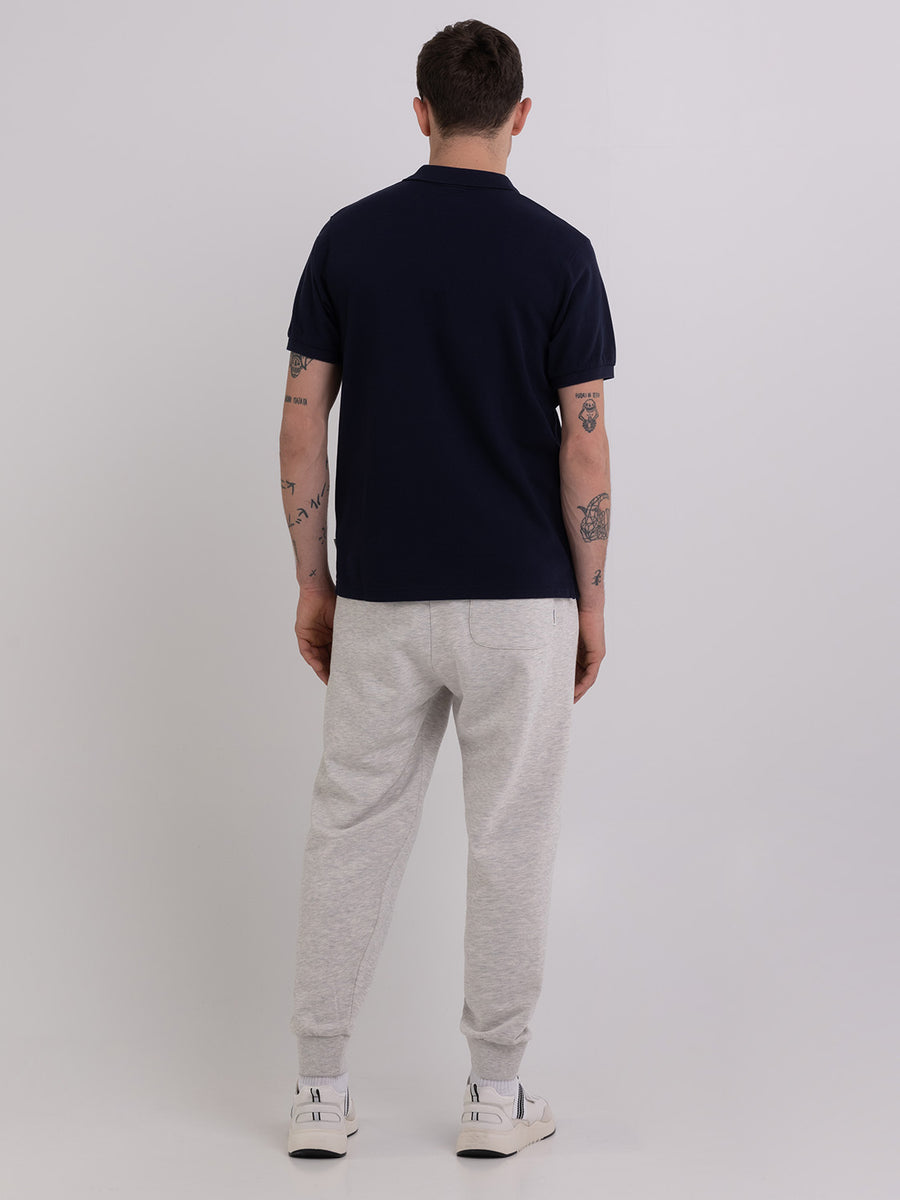 Agender jogger trousers with Arch letter embroidery