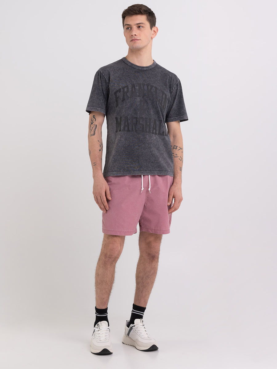 Acid wash garment-dyed t-shirt with arch letter logo print