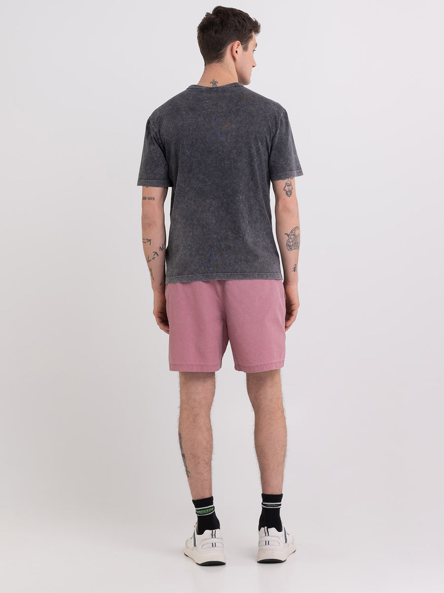 Acid wash garment-dyed t-shirt with arch letter logo print