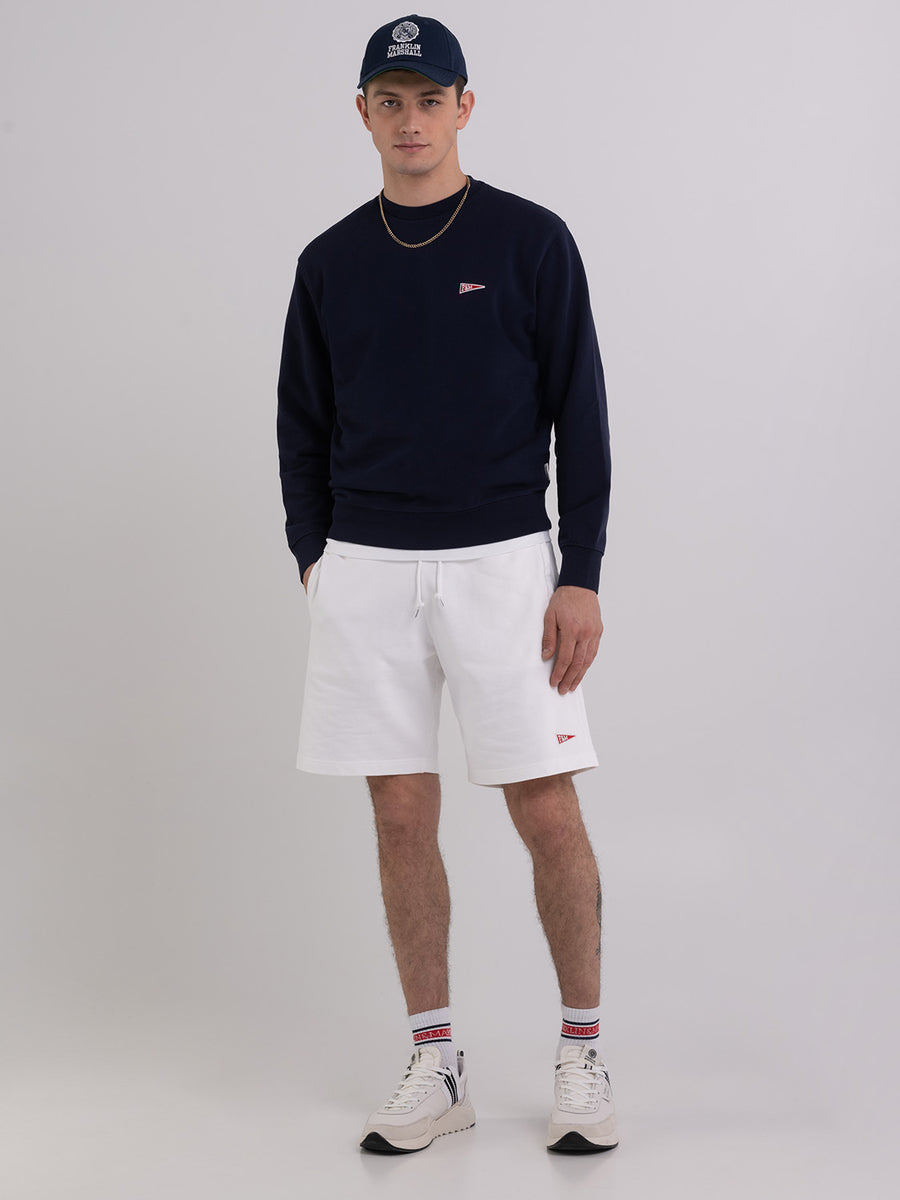Agender fleece shorts with Pennant patch