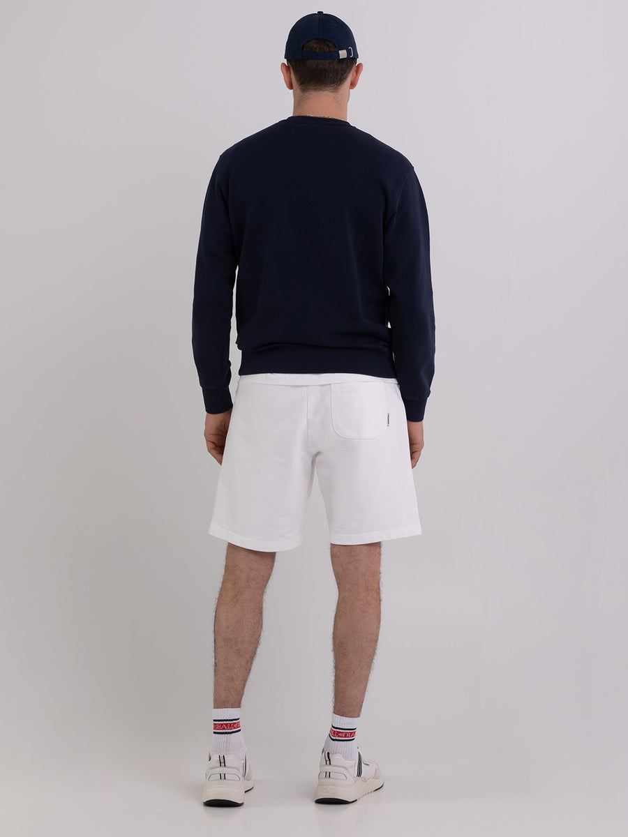 Agender fleece shorts with Pennant patch