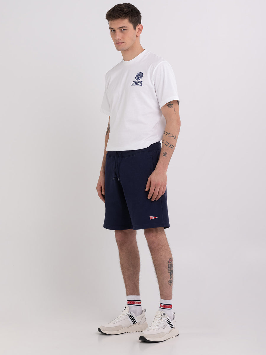Agender fleece shorts with Pennant patch