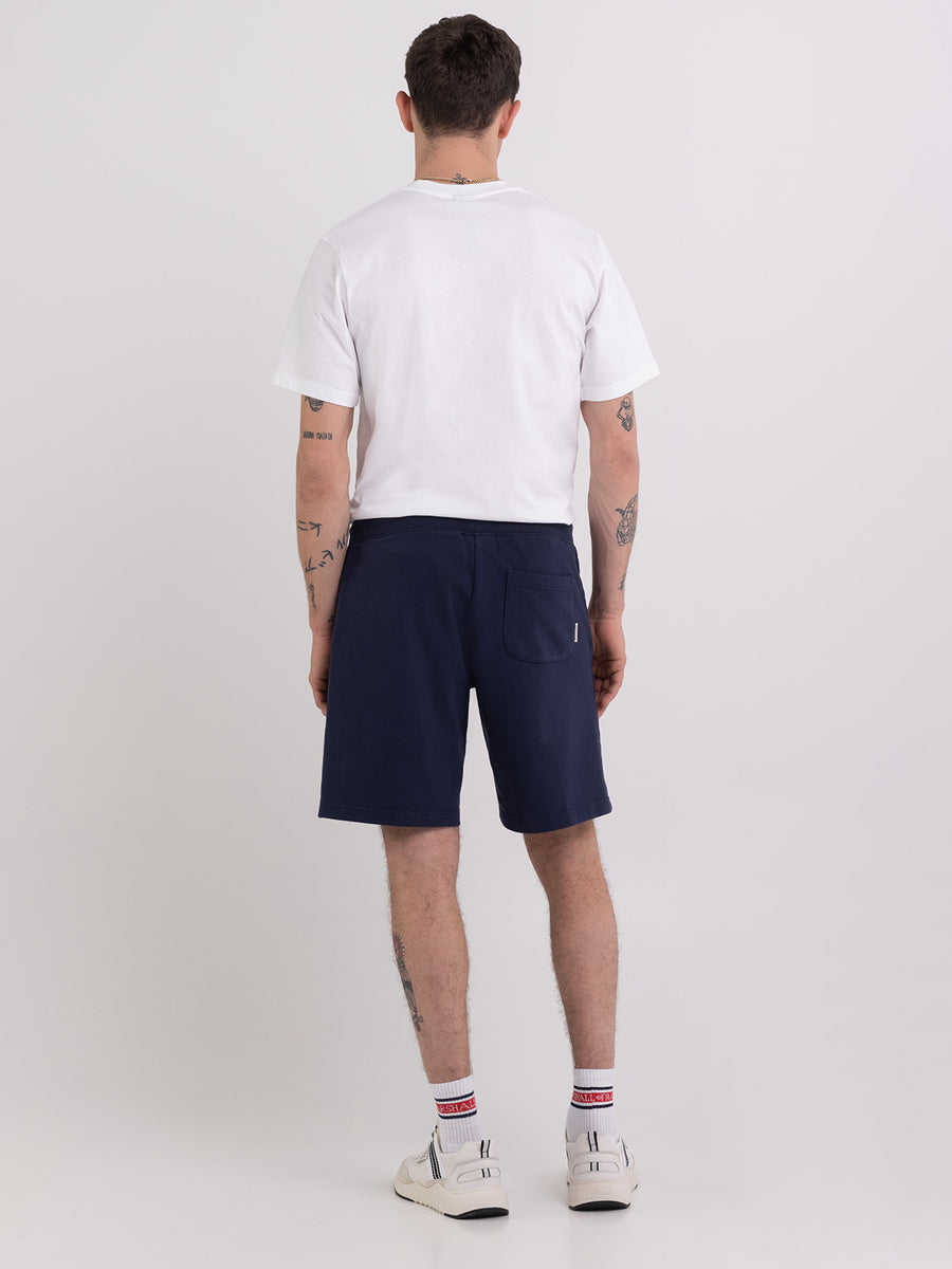 Agender fleece shorts with Pennant patch