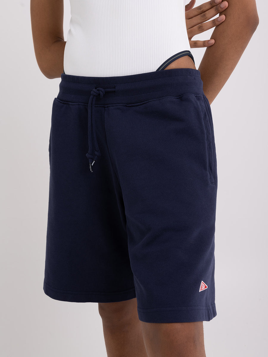 Agender fleece shorts with Pennant patch