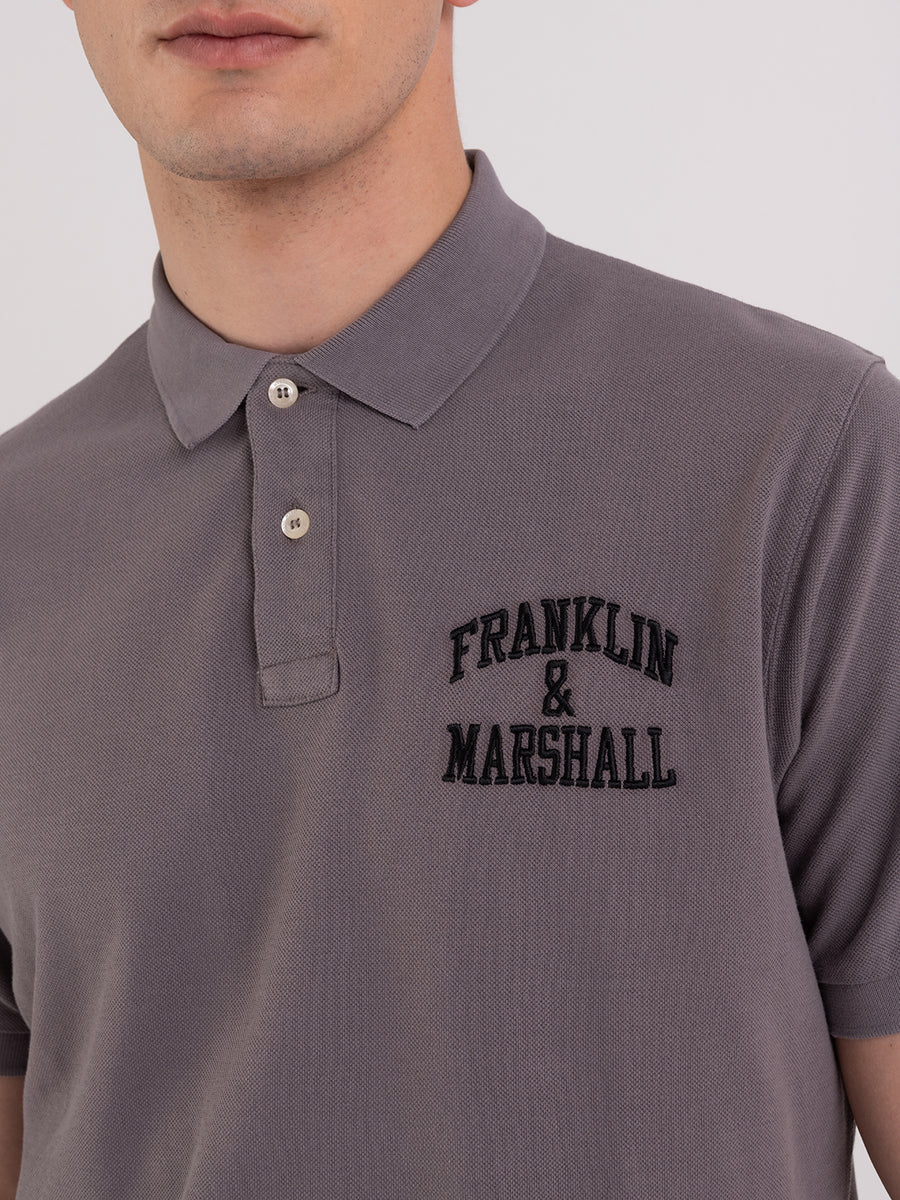 Polo shirt in piqué cotton with arch letter logo embroidery
