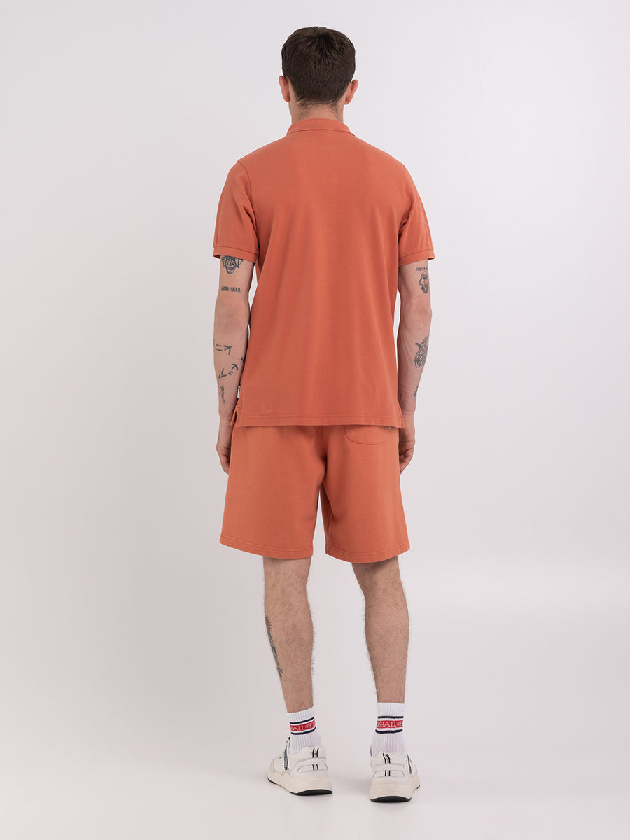 Polo shirt in piqué cotton with arch letter logo embroidery