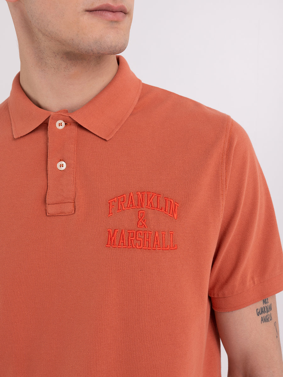 Polo shirt in piqué cotton with arch letter logo embroidery
